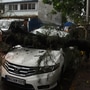 A car damaged under a collapsed tree during Cyclone Tauktae in Vashi. (HT PHOTO)