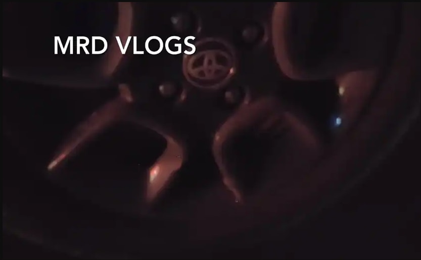 The side profile looks more or less the same, but alloy wheels get Toyota badging. Screenshot courtesy: Youtube/MRDVlogs