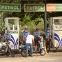 Attendants at a petrol pump filling fuel tanks of motorists in Mumbai. (Photo by Vijay Bate/HT Photo)