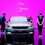 File photo: Staff members stand near a Polestar 2 electric vehicle (EV) displayed during a media day for the Auto Shanghai. (REUTERS)