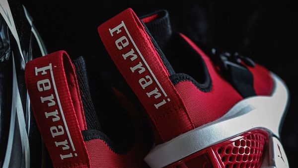 The elevated design of the shoe with ribbons flaunting the brand's name. The elevated design of the shoe with ribbons flaunting the brand's name.