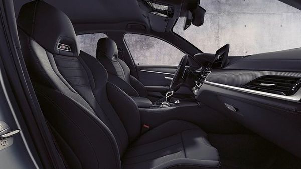 On the inside, there is a 12.3-inch fully digital instrument display and another 12.-3-inch center display.The BMW M5 Competition gets Live Cockpit Professional with BMW Operating System 7.0 which also includes 3D navigation. Other highlights include Harman Kardon Surround Sound System and BMW Display Key. On the inside, there is a 12.3-inch fully digital instrument display and another 12.-3-inch center display.The BMW M5 Competition gets Live Cockpit Professional with BMW Operating System 7.0 which also includes 3D navigation. Other highlights include Harman Kardon Surround Sound System and BMW Display Key.