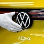 File photo: A technical employee cleans the paint in the final inspection at the production line for the electric Volkswagen model ID.4 electric car. (REUTERS)