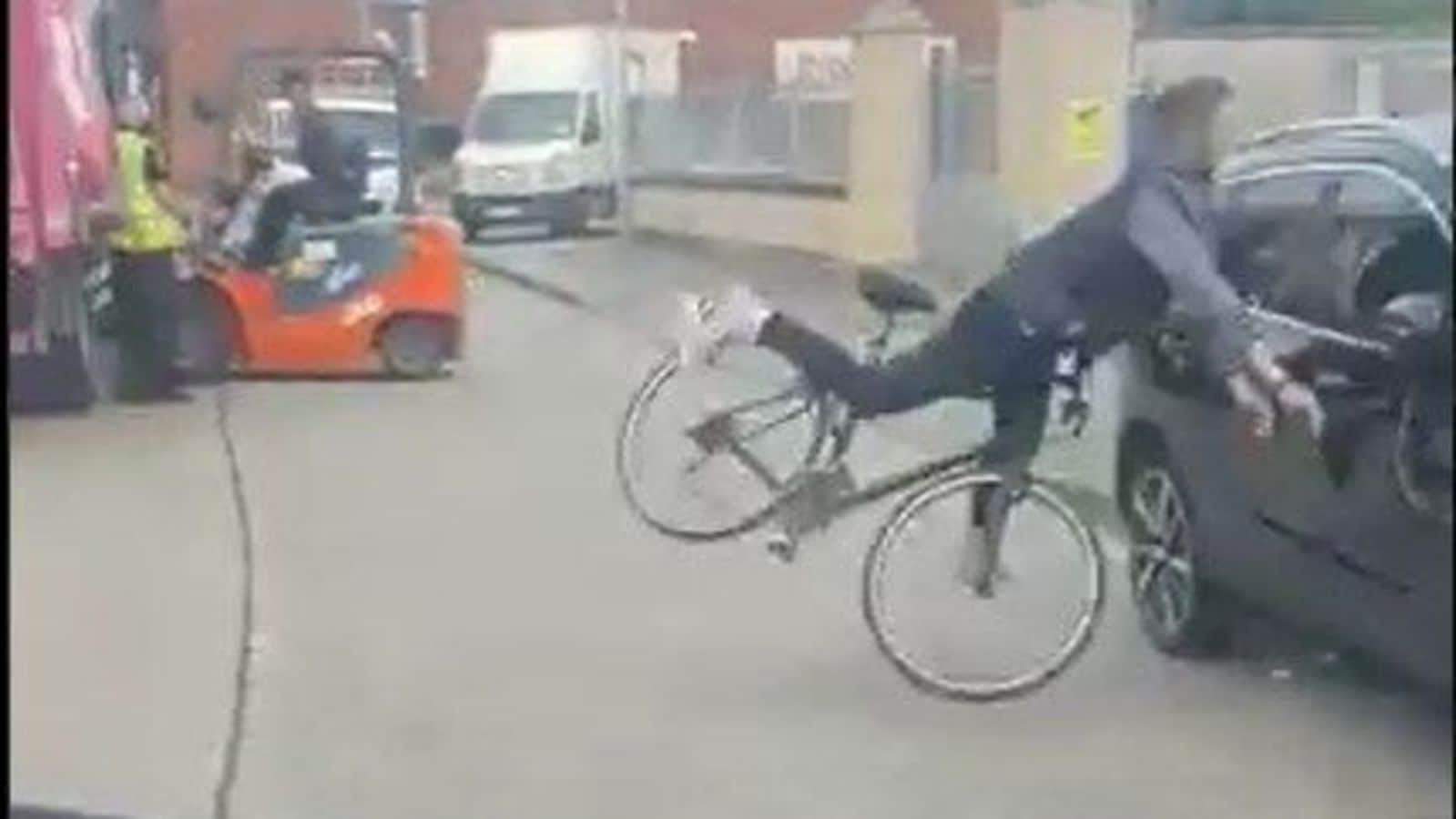 Road rage gone right? Abusive cyclist crashes into parked car | Auto News