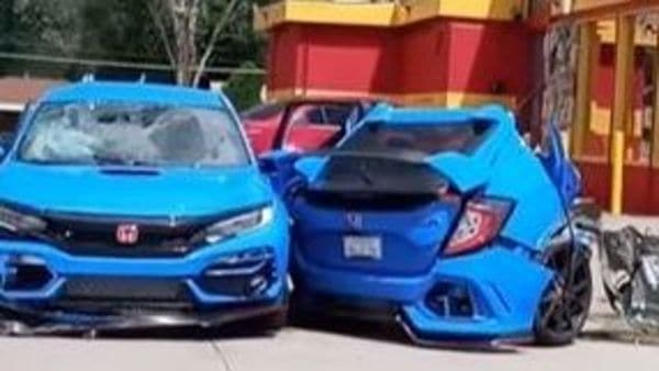 An occupied Honda Civic Type R splits into half after a crash in US