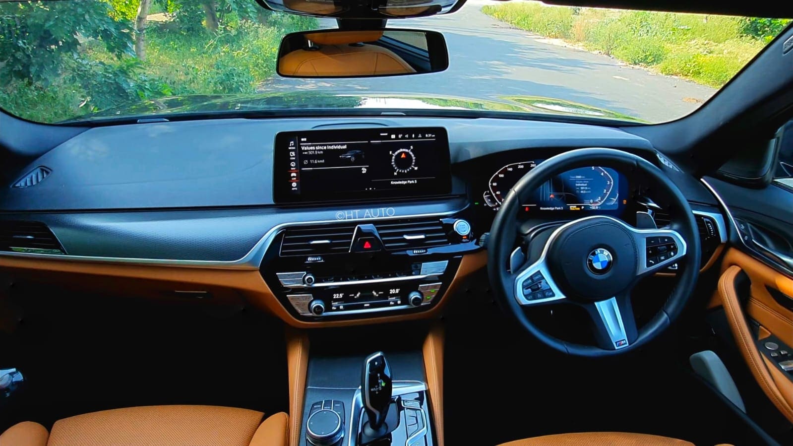 Oriented towards the driver, the cabin of the BMW 5 Series has a neat touch and feel.