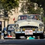 Participants ride in their vintage car during the Statesman Vintage and Classic Car Rally at Connaught Place, in New Delhi, on February 23, 2020. (File Photo) (PTI)