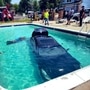 An Infiniti G37X luxury sedan was accidentally driven into the pool by a teenager who escaped unhurt in the incident that took place in Colorado, United States. (Photo courtesy: Twitter/@LakewoodPDCO)