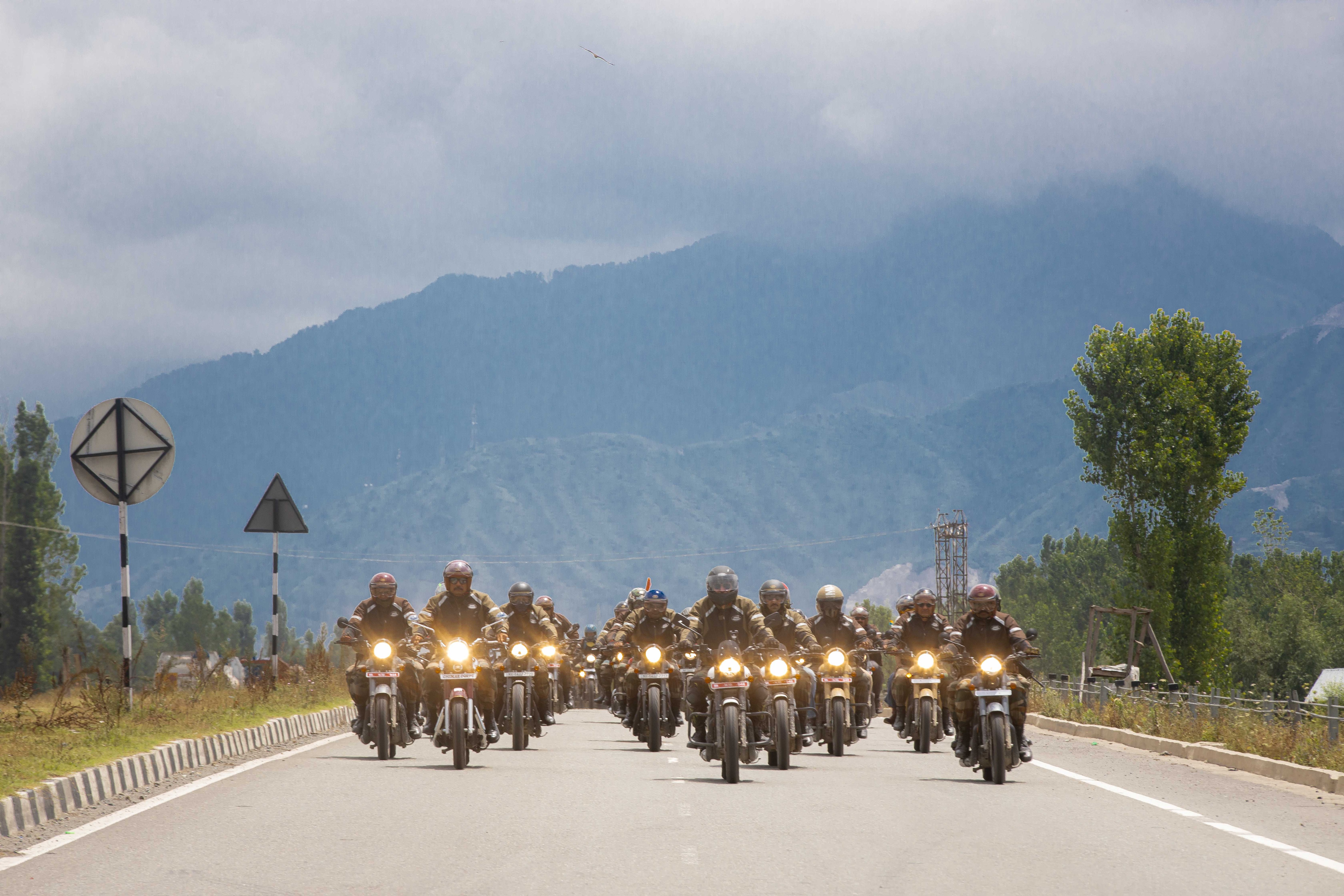 Indian Army personnel ride towards Kargil War Memorial in Drass.