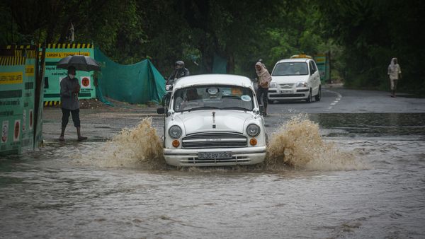 Commuters waded through waterlogged stretches as traffic moved at slow pace at areas including Pragati Maidan (in pic), ITO, underneath Moti Bagh metro station, Dhaula Kuan underpass, Mathura Road, Vikas Marg, Ring Road near IP Flyover, Rohtak Road, among others. (Sanchit Khanna/HT PHOTO)