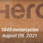 The Hero MotoCorp logo formed by the Hero Splendor bikes.