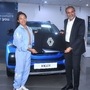 Sudhir Malhotra, Vice President – Sales & Marketing, Renault India (R) handed over the keys to the new Kiger SUV to Mirabai Chanu (L).