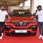 Indian wrestlers Ravi Kumar Dahiya and Bajrang Punia pose with Renault Kiger SUV. While Dahiya won Silver, Punia won Bronze medal for India at the Tokyo Olympics 2021.