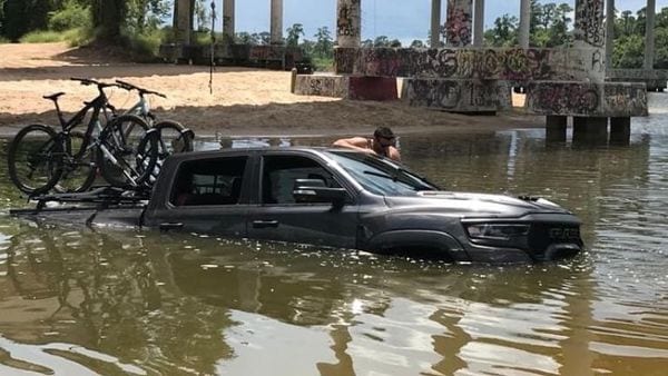 A Ram 1500 TRX takes a dive into deep water body. Here's what happened ...