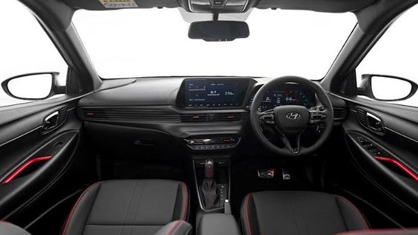 On the inside, the Hyundai i20 N Line will get a 10.25-inch main infotainment screen and an all-digital instrument cluster. It will feature unique three-spoke steering design, chequered-flag leather seats with N Line logo, red interior highlights, red ambient light and metal pedals, among other highlights.