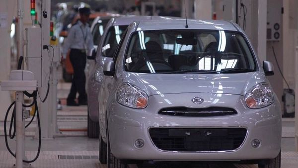 A security guard walks past Nissan Micra cars lined at the Renault-Nissan Alliance auto plant in Chennai. (File photo) (REUTERS)