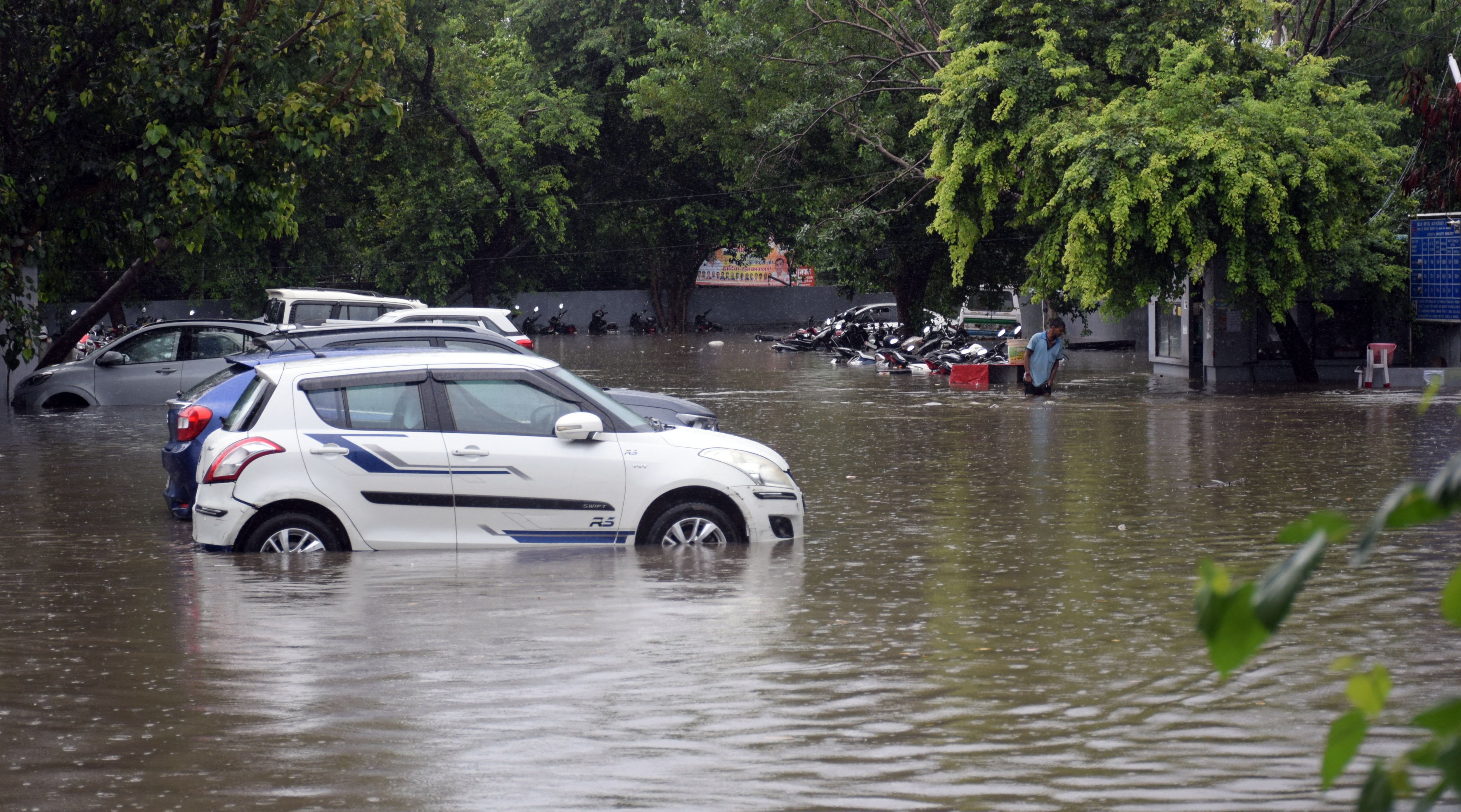 In pics: Horror images from Delhi roads as heavy rain drowns all | HT Auto