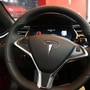 The latest Tesla FSD software update can also navigate better, deliver smoother turns, roundabouts and merges. (AFP)