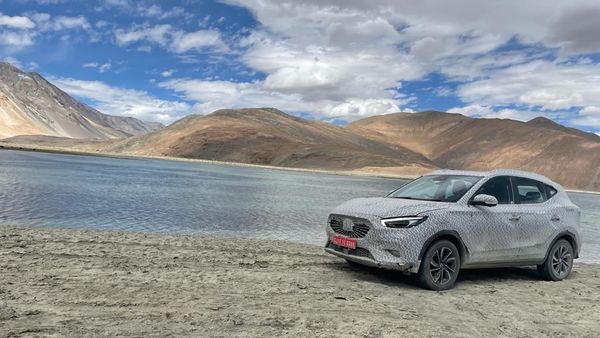 A test unit of MG Astor is seen parked next to the scenic Pangong Tso lake in Ladakh.