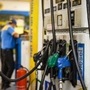 File photo: A man looks at the counter as a vehicles is filled with fuel at a petrol pump in New Delhi. (File photo used for representational purpose only) (HT_PRINT)