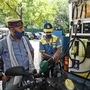 File photo of a worker refuelling a motorbike at Janpath in New Delhi, India&nbsp;