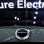 A Pure Electric sign is seen above a Volvo vehicle displayed during a media day for the auto show in Shanghai, China. (File Photo) (REUTERS)