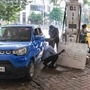 Photo of a petrol pump attendant writing revised fuel prices on a board in Kolkata. (PTI)
