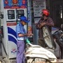 A petrol pump staff refills fuel in a vehicle during the continuous hike in fuel prices. in New Delhi. (Shaurya Yadav)