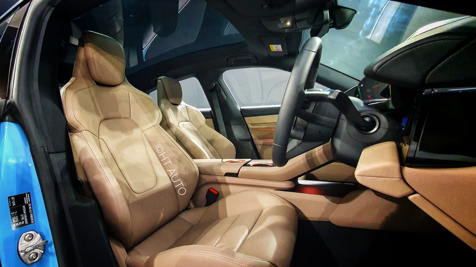 The cabin of the Porsche EV is typically premium and sporty with top-notch materials on the dashboard, seats and all four doors. The cabin of the Porsche EV is typically premium and sporty with top-notch materials on the dashboard, seats and all four doors.