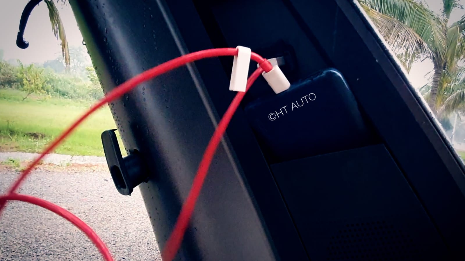 Having a USB port to charge phones is great. A storage space for phones is even better but larger phones may pop out, especially on broken roads.