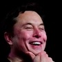 Tesla CEO Elon Musk (L) and Twitter CEO Parag Agrawal.