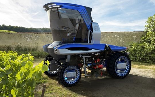 The Straddle concept tractor has a large single door and gets rotating seats.