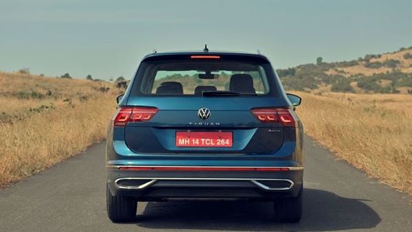 The slimmer LED taillights and Tiguan lettering moved to the center of the tailgate make the rear of the 2021 Volkswagen Tiguan SUV look compact.