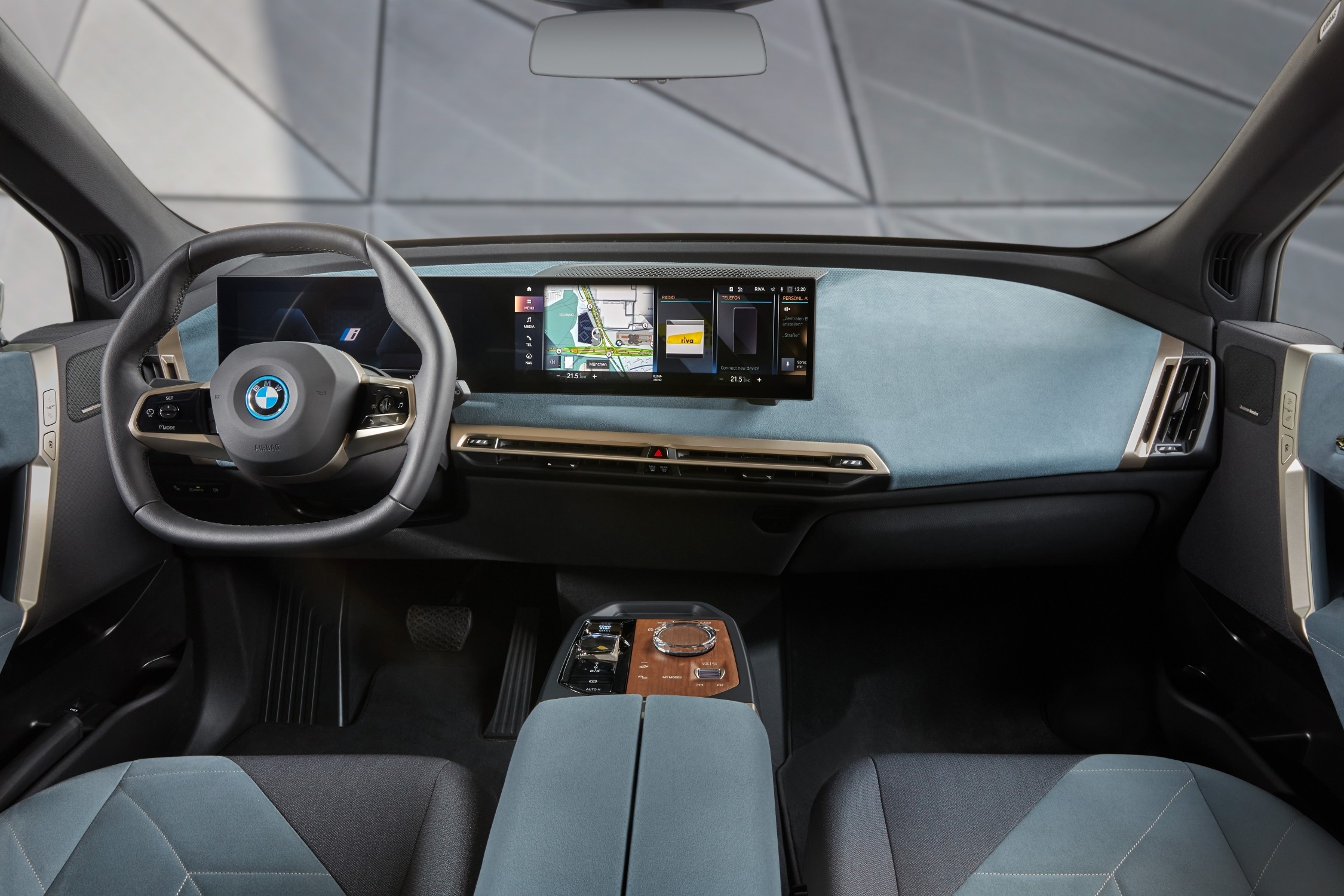 Studio photo showcasing the dashboard layout of the new BMW iX. This is the LHD version available in international markets.