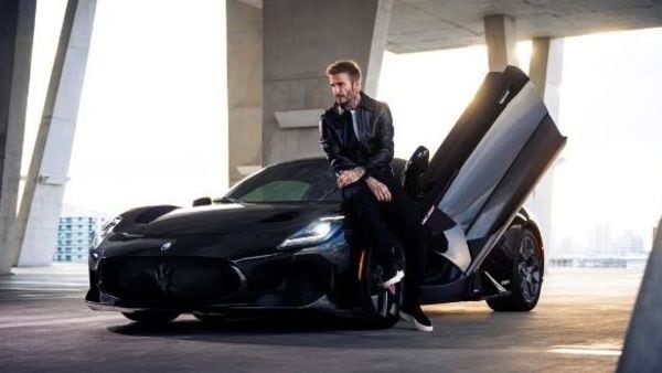 Former professional footballer David Beckham posing with his Maserati MC20 Fuoriserie Edition 