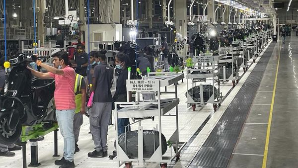An image of Ola Electric workers at the assembly line of the S1 and S1 Pro electric scooters at its Futurefactory in Tamil Nadu ahead of delivery deadline of December 15. (Photo courtesy: Twitter/@bhash)