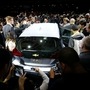 Journalists look over a Chevrolet Bolt EV after it is unveiled during a General Motors keynote address at the 2016 CES in Las Vegas. (File Photo) (REUTERS)