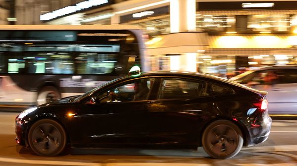 In the fast lane: A Tesla EV is seen in Paris, France. (REUTERS)