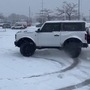 Owner of a brand new Ford Bronco decides to perform donuts on the dealer's snow-covered parking lot. (BRONCO 6th Gen/Facebook)