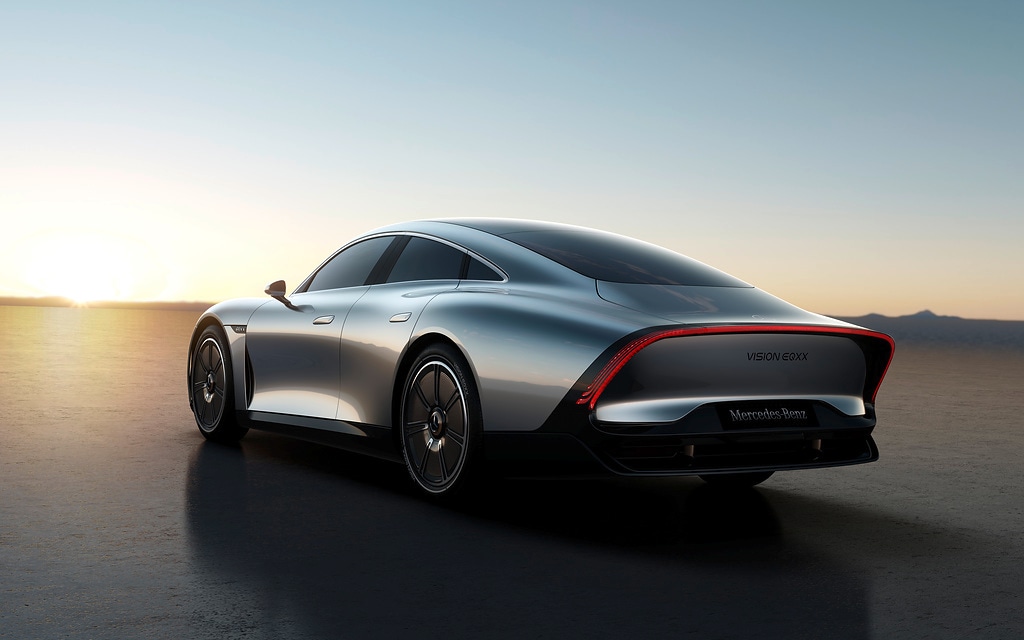 Mercedes Vision EQXX concept gets a sleek LED taillight expanding the whole width of the car. Also, there is a rear diffuser that gives a sporty and muscular stance to the luxury coupe. Mercedes Vision EQXX concept gets a sleek LED taillight expanding the whole width of the car. Also, there is a rear diffuser that gives a sporty and muscular stance to the luxury coupe.