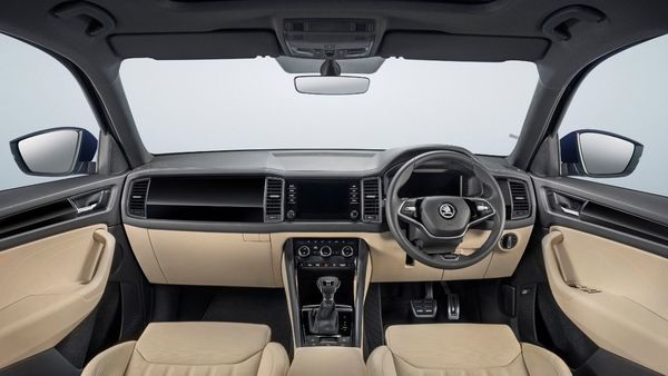 The 2022 Skoda Kodiaq facelift SUV comes with a black and beige themed dual-tone interior.