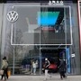 People walk past an ID. Store X showroom of SAIC Volkswagen in Chengdu, Sichuan province in China. (File photo) (REUTERS)