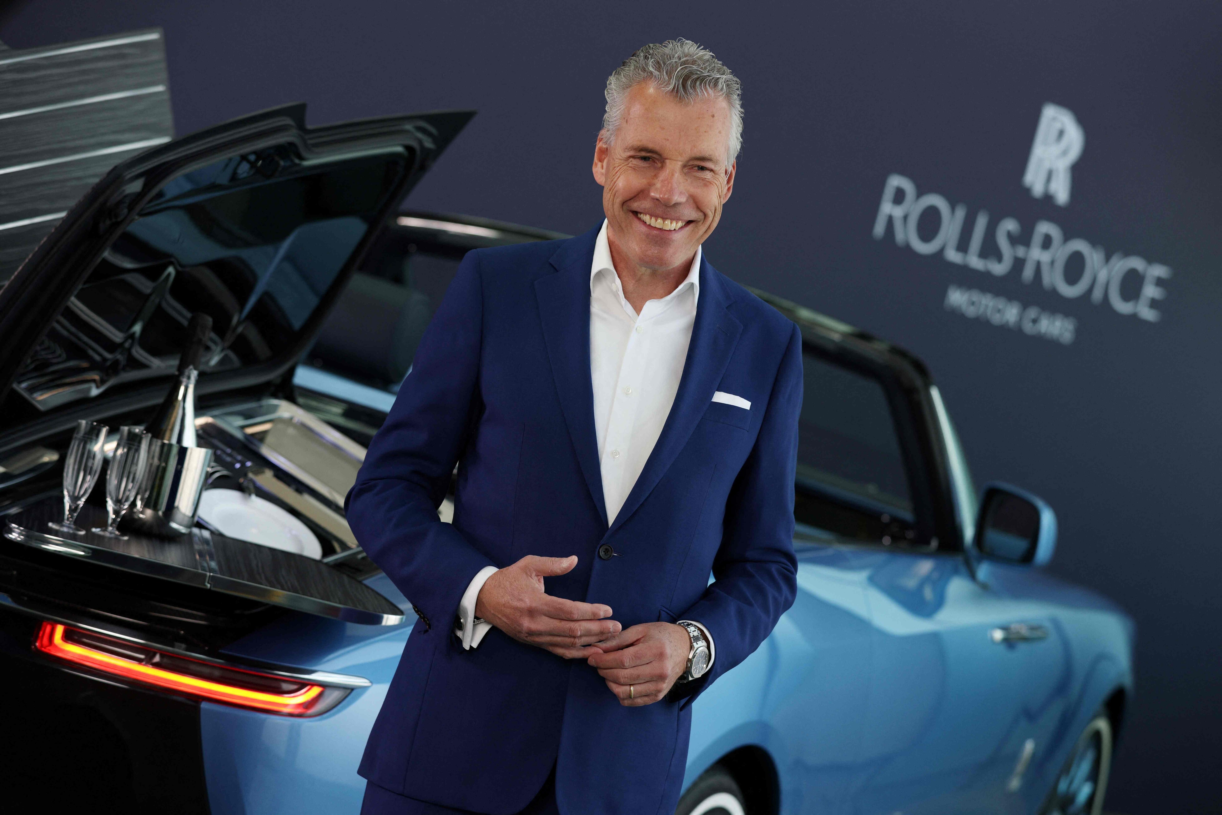 File photo: Rolls-Royce CEO Torsten Muller-Otvos speaks by a Rolls Royce Boat Tail on show at the company's Goodwood headquarters.