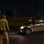 Police personnel stand guard at a road checkpoint near India Gate. (AFP)