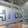 FILE PHOTO: A sign of Foxconn is seen at a glass door inside its office building in Taipei, Taiwan  (REUTERS)