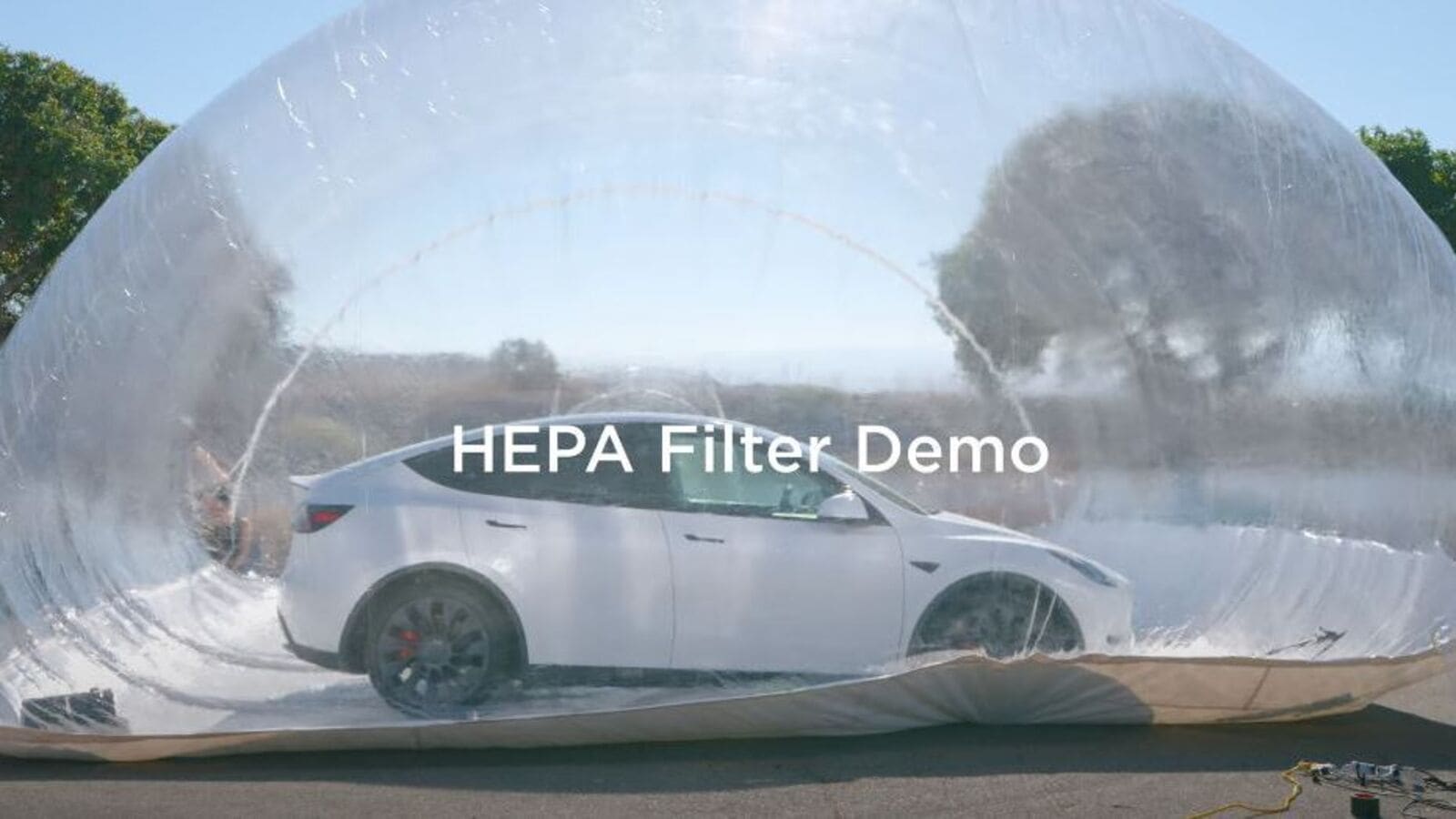 Tesla Demonstrates How Its HEPA Air Filter Could Beat A BMW SUV In Being  Bioweapon Free - ZigWheels