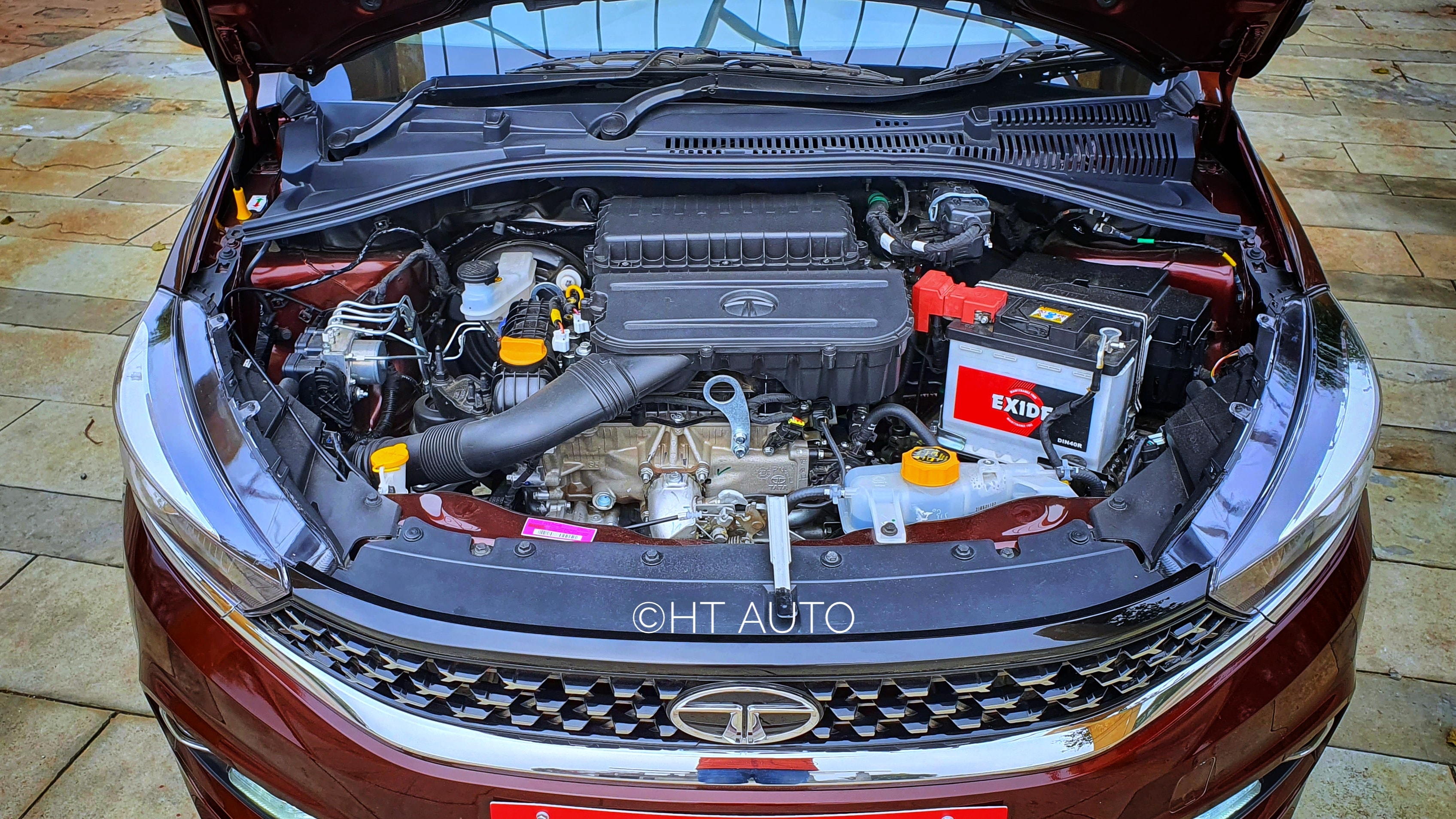 Under the hood, Tata continues to rely on its 1.2-litre three-cylinder naturally-aspirated petrol engine. The engine can produce a maximum output of 73.4 PS and 95Nm of torque. It is slightly less than 86 PS of power and 113 Nm of torque on petrol mode. (Photo: Sabyasachi Dasgupta/HT Auto) Under the hood, Tata continues to rely on its 1.2-litre three-cylinder naturally-aspirated petrol engine. The engine can produce a maximum output of 73.4 PS and 95Nm of torque. It is slightly less than 86 PS of power and 113 Nm of torque on petrol mode. (Photo: Sabyasachi Dasgupta/HT Auto)