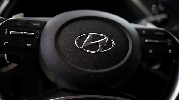 File Photo: The logo of Hyundai Motors is seen on a steering wheel of a all-new Sonata sedan.