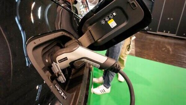 File photo of BMW iX being charged at the Motor Show in Essen, Germany. (AP) File photo of BMW iX being charged at the Motor Show in Essen, Germany. (AP)