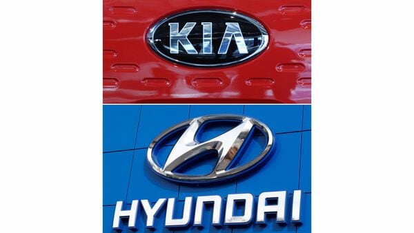 File photo: This combination of file photos shows the logo of Kia Motor and the Hyundai logo. (AP)
